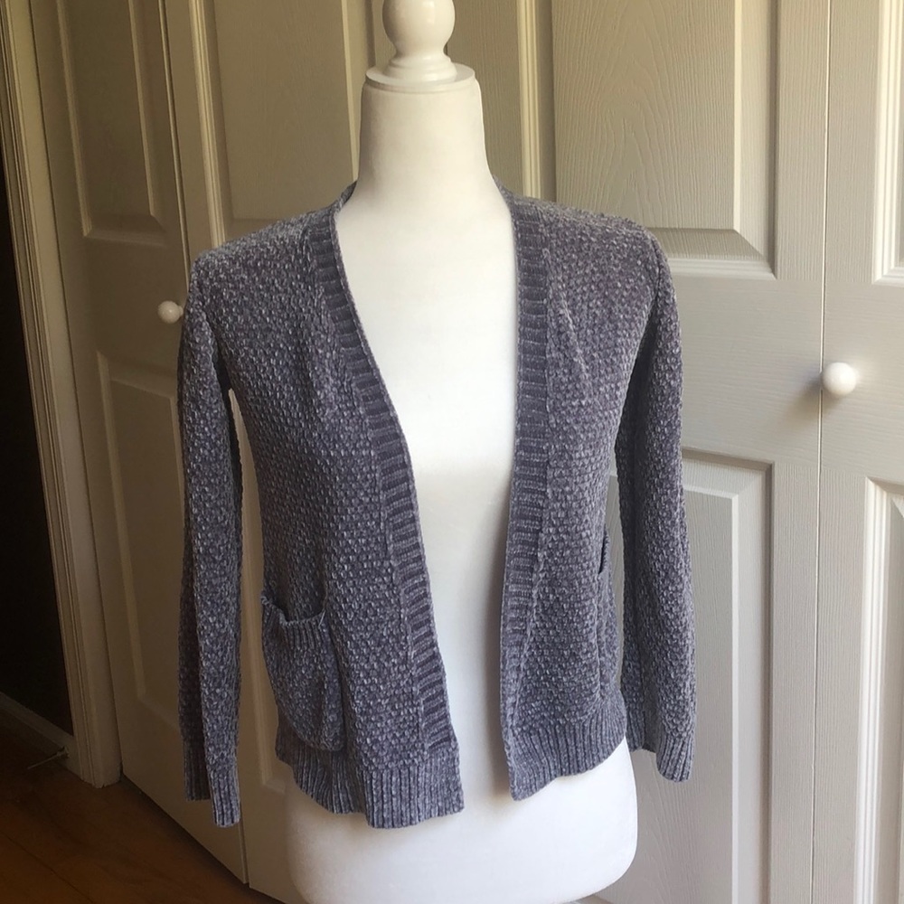 Grey cardigan.